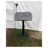 Black adjustable podium with built in microphone