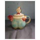 Tom the pipers son boy and pig tea pot