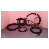 4 guitar amplifier cords and 1 microphone cord 3