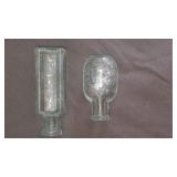 Two mini glass apothecary pharmacy bottles.