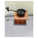 Antique cast-iron. And wood coffee grinder