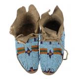 C. 1870 Northern Cheyenne Beaded Buffalo Moccasins