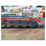 TIN PISTON SILVER MOUNTAIN TRAIN TOY