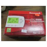 PROGRAMMABLE HEAT PUMP THERMOSTAT