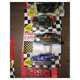 11-- 1:4 DIECAST RACE CARS