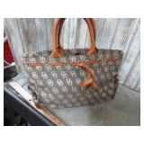 PURSE MARKED DOONEY & BOURKE -- HAS STRINGS & WEAR
