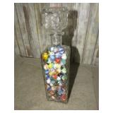 DECANTER FILLED W/ MARBLES