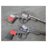 2-- MINI CAP GUNS
