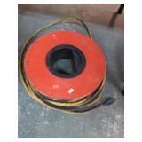 EXTENSION CORD ON SPOOL