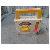 1981 FISHER PRICE WIND-UP RADIO TOY