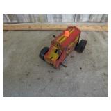 TIN TOY WIND-UP BULLDOZER