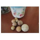 EARLY CLAY MARBLES IN TEA CUP
