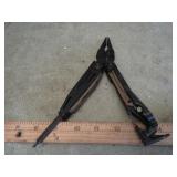 LEATHERMAN MUT MULTI TOOL -- SOME DAMAGE