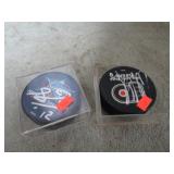 AUTOGRAPHED HOCKEY PUCKS