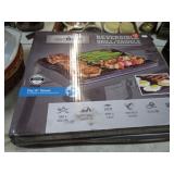 2-- REVERSIBLE CAST IRON GRILL / GRIDDLES