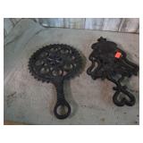 2-- CAST IRON TRIVETS