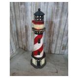 CAST IRON LIGHT HOUSE CANDLE HOLDER