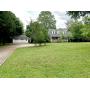 3,600+/- Sq. Ft. Brick Home on 1.6+/- Acres with Shop - County Taxes - City Convenience! AUCTION June 12th