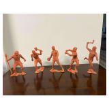 4 Vintage Marx Cavemen figures and 1 Vintage Louis Marx American Indian 6” Toy Figures