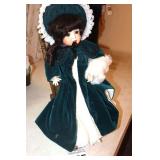 Vintage Porcelain Collector Doll by Katherine Garavents - in 1900 green dress, cape, muff BD1 19822 - in Wood Rocking Chair 20"