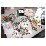 Variety of Costume Jewelry: Necklaces, Watches, Rings, Bracelets, Pins, Earrings Shell Dish etc.