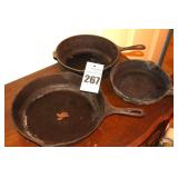 2 Cast Iron Skillets & one Deep Pot with handle