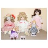 Variety of Vintage Dolls: Porcelain/Cloth 2 on stands, one music box etc.
