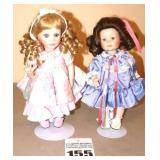 2 Limited Edition Marie Osmond Porcelain Collector Doll on Stands: Pink dress 875/2000 signed & Blue Dress 2273/5000 signed