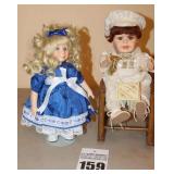 Little Jewel Holly Hunt Porcelain Doll  on stand & Vintage Collector Choice Musical Porcelain Boy Doll with Horn in small wood rocking chair