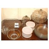 Variety of Glass Serving Pieces - Domed Pedestal Cake Plate Platter Bowls, cruet, 8 dessert plates, 4 bowls with plastic lids, dome etc.