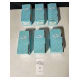 Set of Six Milestone Miniature Porcelain Dolls