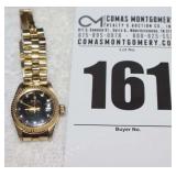 Rolex Replica Oyster Perpetual Lady -Date Watch with Gold Band and Black Diamond Dial