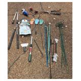 Bucket with Yard Art and Yard Tools