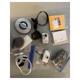 Assortment of Cameras and Headphones