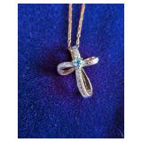 Cross Necklace with Heart Shaped Blue Topaz on 18” Chain.