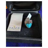 Sajen Goddess Ring with a Carved Face and Various Gemstones