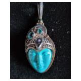 Pendant with a Carved Face