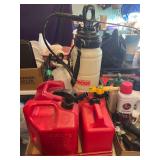 4 Gas Cans and 2 Sprayers