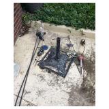 Assorted Yard Stakes and Umbrella Holder and Chimes