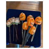 6 Pumpkin Yard Stakes and 5 Metal Scarecrows