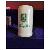 Vintage Stoneware Beer Stein with Green Branding for Bitburger Pils.