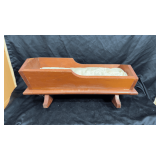 Wooden doll cradle