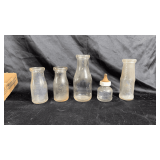 Antique milk bottles.