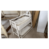 Antique wicker bassinet.