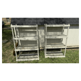 Four plastic shelf units