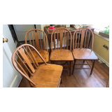 Four vintage dining chairs.