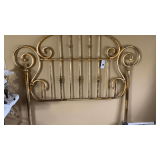 Antique brass bedframe.