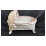 Vintage wicker doll cradle