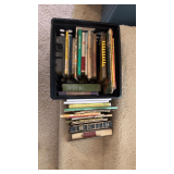 Milk crate with books