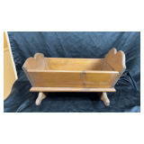 Wooden doll cradle